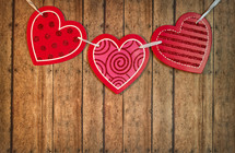 red heart banner on wood 