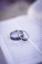 rings on the pages of a Bible 