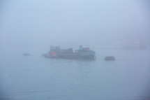 barge in dense fog 