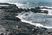 waves and rocks along a shore 