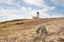lighthouse on a hill 