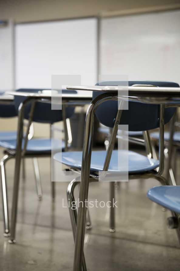 student desks in a classroom 