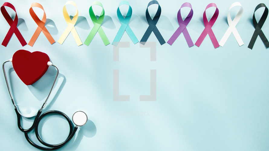 world cancer awareness day ribbons background with copy space