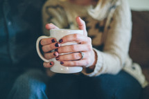 woman holding mug