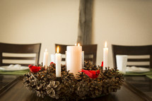 pine cone wreath and candles centerpiece 