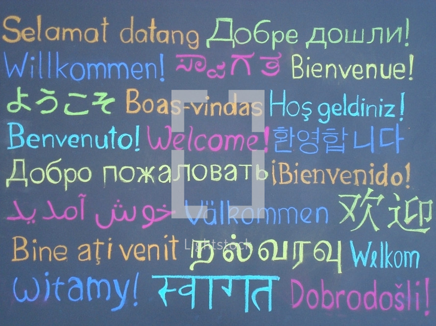 the word WELCOME written in many languages to our brothers and sisters all over the world