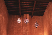 lanterns hanging from rafters 