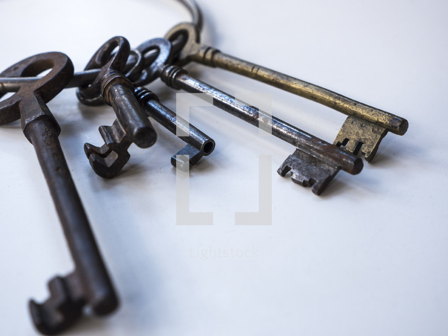 Old vintage keys on white background - Keys to the Kingdom