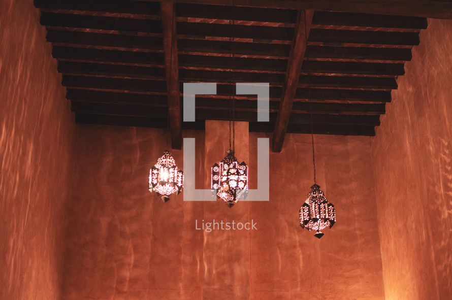 lanterns hanging from rafters 