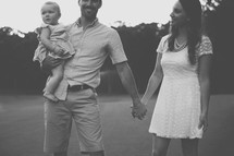 father, daughter, mother, outdoors, holding hands, love, parenting, young family, family, happy