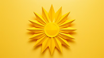 Origami sun on yellow background.