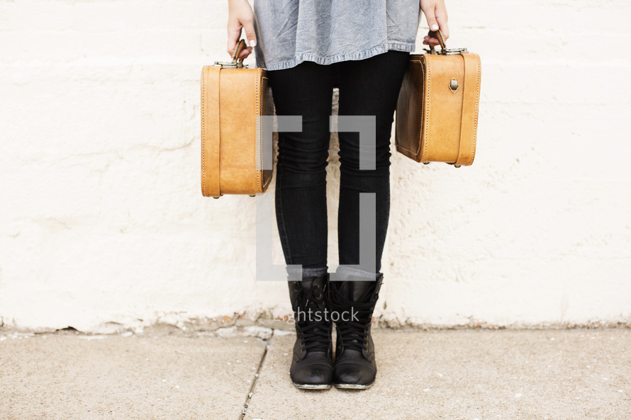 woman holding a suitcases