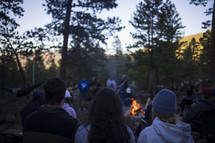 teen around a campfire 