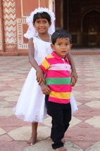 two children in India at first communion 