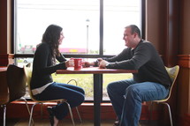 a couple having coffee together 