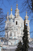 Smolny cathedral domes and steeples with gold crosses