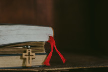 cross bookmark in a Bible 