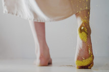 woman with glitter on her feet 