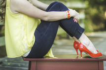 woman wearing red heels