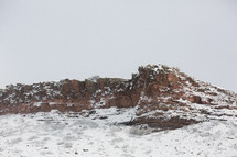 snow on a rock peak 