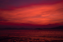 red fiery sky over the ocean 