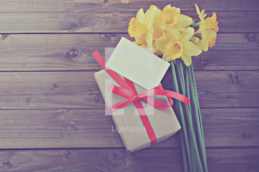 simple gift and a bouquet of daffodils 