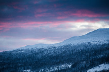 purple sky over snowy mountains 
