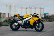 Aprilia RSV4 sports motorbike, superbike motorcycle, yellow racing colours