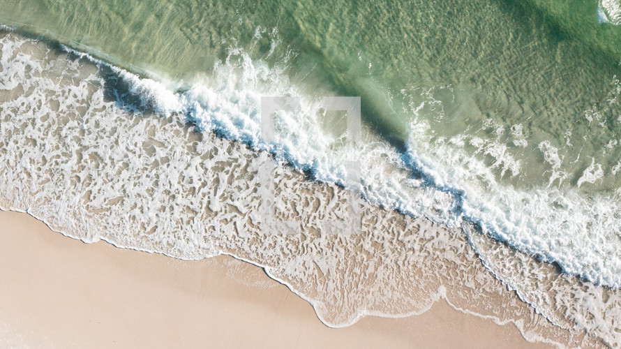 Beautiful aerial shot of a white sand Florida beach.