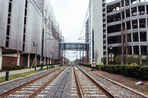 train tracks and a skywalk 