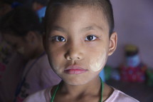 An Asian girl with painted face 