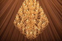 Huge crystal chandelier with fabric ceiling