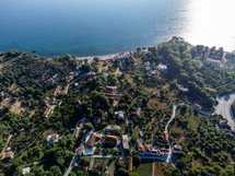 aerial view over a coastal community 