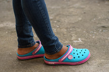 child's feet in Croc shoes 