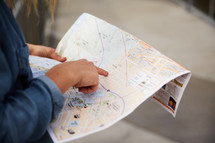 woman looking at a street map 