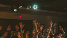 raised hands of praise during a worship service 