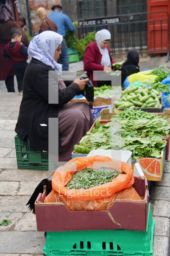 vendors selling produce on the streets of Jerusalem 
