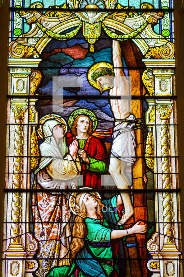stained glass window of the crucifixion 