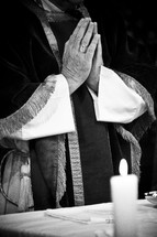 priests praying hands 