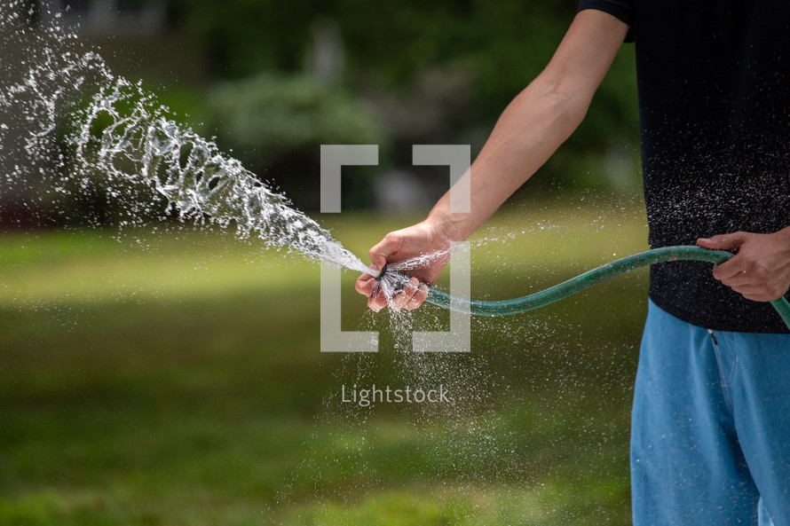 watering with a hose 