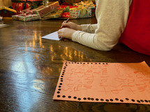 a child writing a letter to Santa 