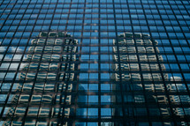 reflection of skyscrapers in windows 