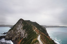 cliffs along a shoreline and path 