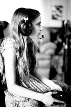 female child playing video games 