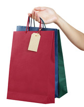 woman holding gift bags 