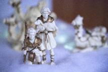 shepherd figurines from a nativity scene 