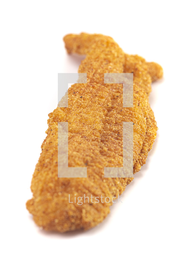 Breaded and Fried Fillets of Fish on a white background 