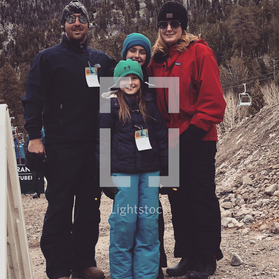 family at the ski slopes 