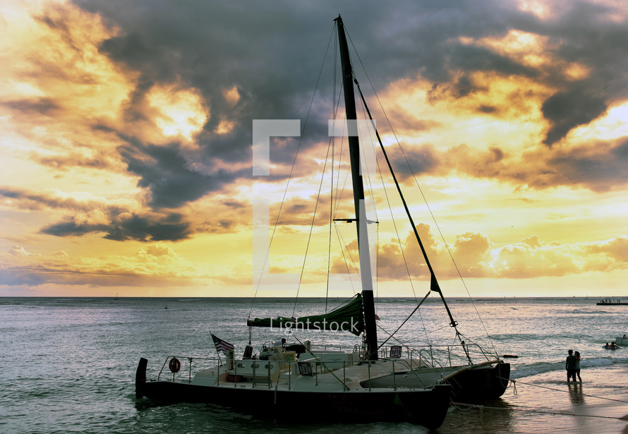 catamaran on a shore at dusk 