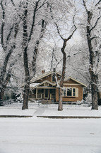 house in winter snow